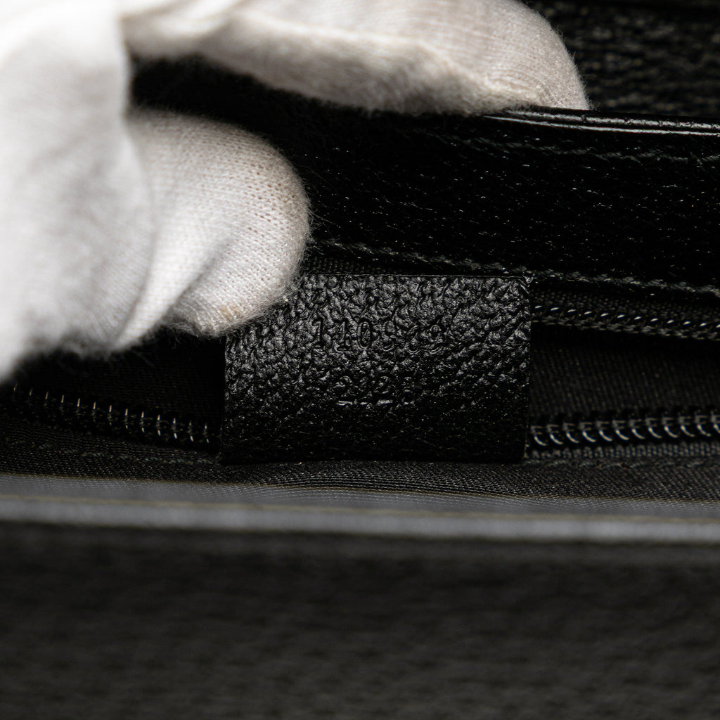 Gucci Studded Leather Clutch